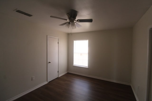309 W Estes Ave, Midland, TX 79701 - unfurnished room featuring dark wood finished floors and ceiling fan