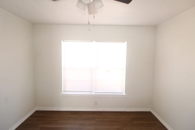 309 W Estes Ave, Midland, TX 79701 - empty room featuring dark wood-style floors and a ceiling fan