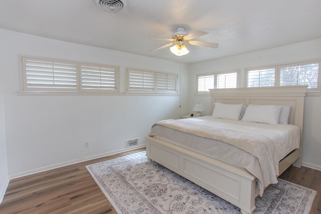 bedroom featuring ceiling fan and wood-type flooring