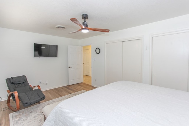 bedroom featuring ceiling fan and light hardwood / wood-style flooring