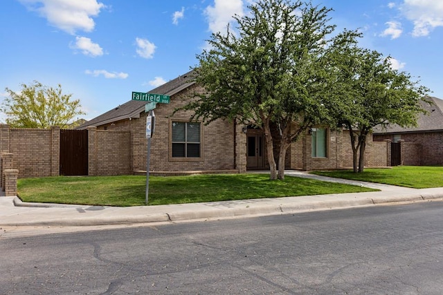 3101 Fairfield Ln, Midland, TX 79705 - view of property hidden behind natural elements featuring brick siding