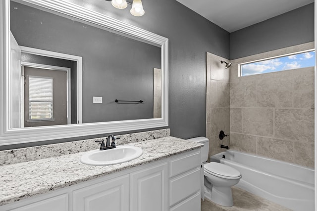 3101 Fairfield Ln, Midland, TX 79705 - bathroom with vanity, toilet, shower / washtub combination, and tile patterned floors