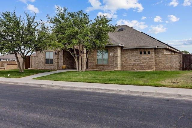 3101 Fairfield Ln, Midland, TX 79705 - view of front of home with brick siding and roof with shingles