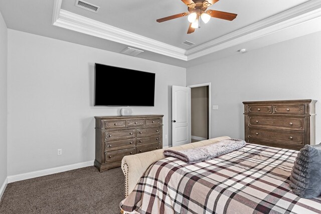 3101 Fairfield Ln, Midland, TX 79705 - carpeted bedroom with a raised ceiling, crown molding, baseboards, and a ceiling fan