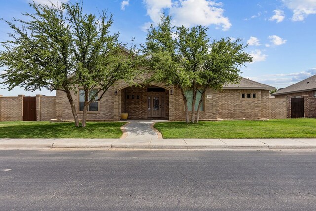 3101 Fairfield Ln, Midland, TX 79705 - obstructed view of property featuring brick siding