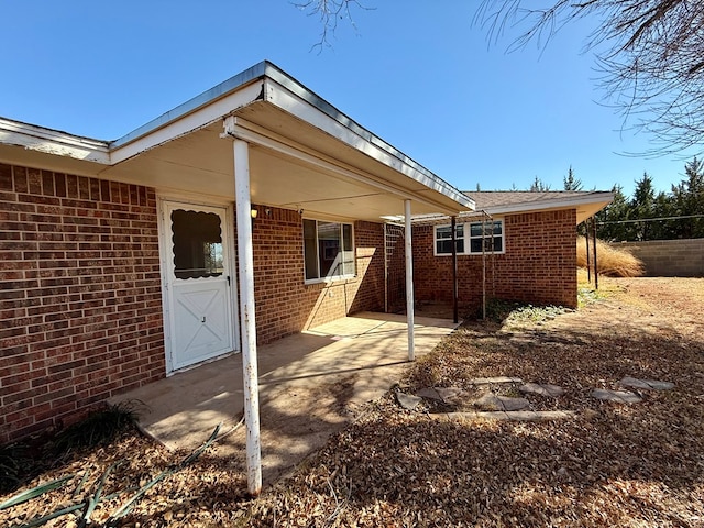 rear view of house featuring a patio area