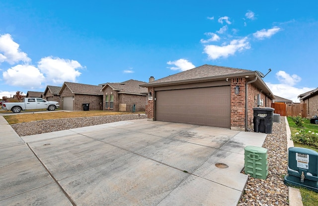 ranch-style home with a garage