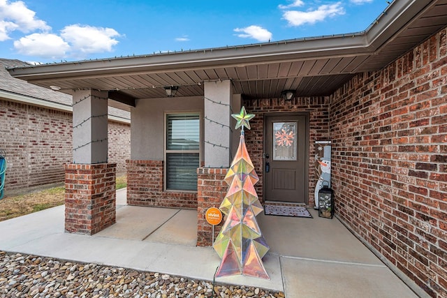 doorway to property with a porch