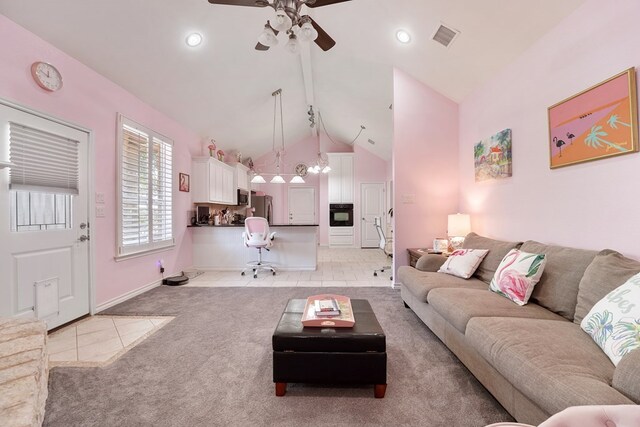 living room with ceiling fan, high vaulted ceiling, and light tile patterned floors