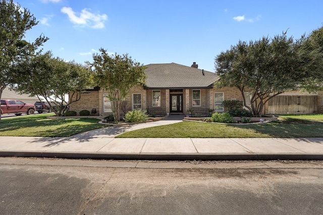 view of front facade with a front lawn