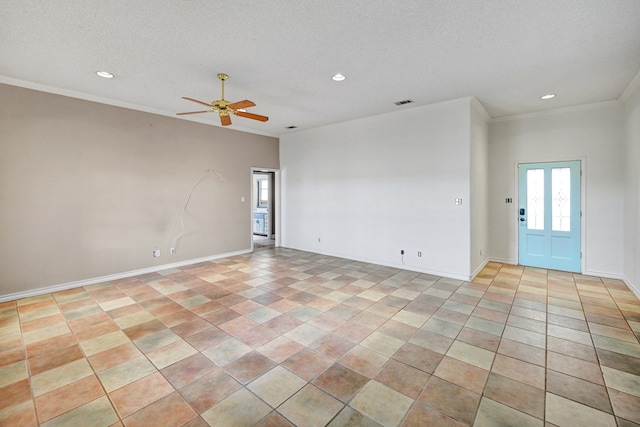 empty room with ornamental molding, recessed lighting, and a textured ceiling