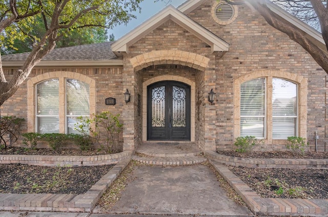 doorway to property featuring french doors