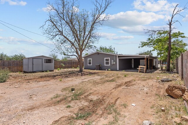 3902 Thomason Dr, Midland, TX 79703 - fenced backyard with an attached carport and central AC