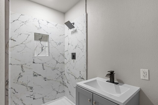 3902 Thomason Dr, Midland, TX 79703 - bathroom with vanity and a marble finish shower