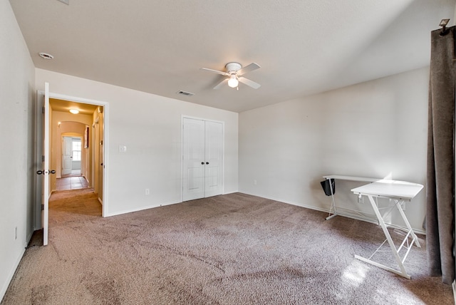 504 Wagner, Midland, TX 79706 - unfurnished bedroom with carpet floors, baseboards, a ceiling fan, and a closet