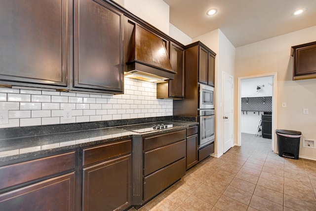 504 Wagner, Midland, TX 79706 - kitchen featuring electric stovetop, dark brown cabinets, tasteful backsplash, and recessed lighting