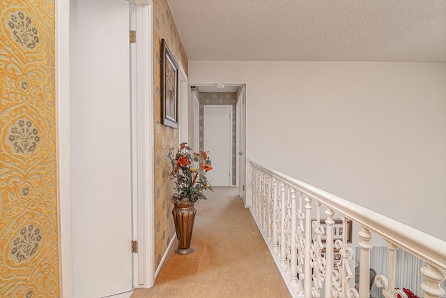 3108 Seaboard Ave, Midland, TX 79705 - hallway featuring light carpet and a textured ceiling