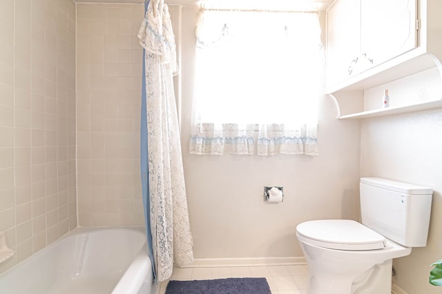 3108 Seaboard Ave, Midland, TX 79705 - full bathroom featuring baseboards, toilet, shower / tub combo, and tile patterned flooring