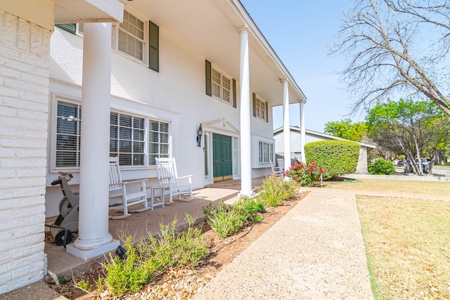 3108 Seaboard Ave, Midland, TX 79705 - view of home's exterior featuring a porch and stucco siding