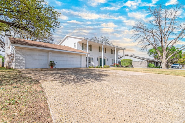 3108 Seaboard Ave, Midland, TX 79705 - neoclassical / greek revival house featuring driveway, brick siding, and a garage
