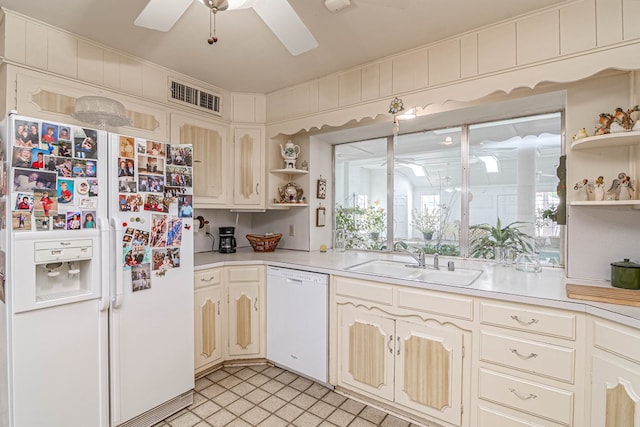 3108 Seaboard Ave, Midland, TX 79705 - kitchen featuring white appliances, open shelves, a sink, light countertops, and ceiling fan