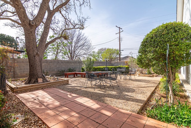 3108 Seaboard Ave, Midland, TX 79705 - fenced backyard featuring a patio area and outdoor dining area