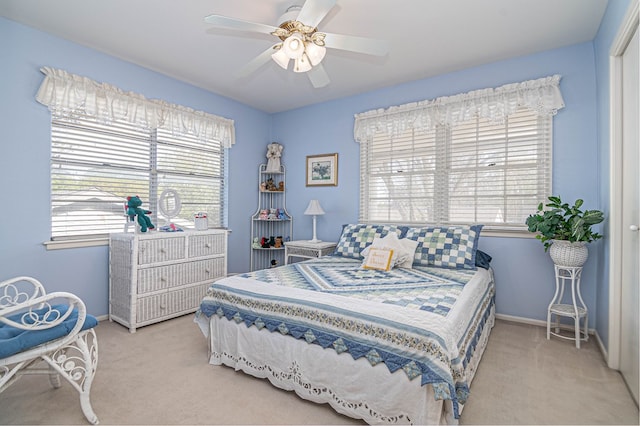 3108 Seaboard Ave, Midland, TX 79705 - bedroom with carpet, baseboards, and a ceiling fan