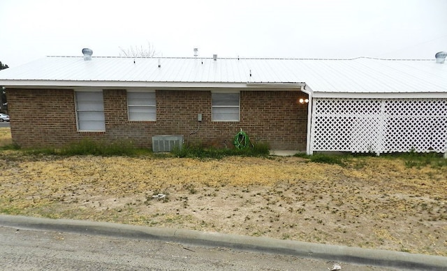 view of property exterior featuring central AC