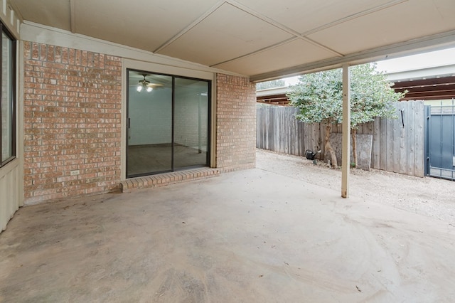 view of patio / terrace featuring fence