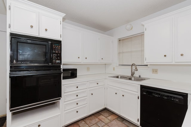 kitchen with sink, a textured ceiling, black appliances, and white cabinets