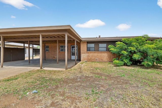 204 Acklen, Midland, TX 79703 - back of property with brick siding and a carport
