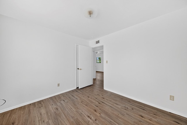204 Acklen, Midland, TX 79703 - empty room featuring wood finished floors