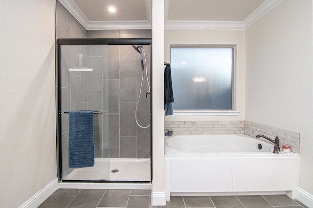 9029 Desert Ave, Odessa, TX 79765 - full bathroom featuring tile patterned flooring, a garden tub, a stall shower, crown molding, and baseboards