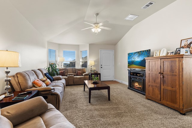 living room with light carpet, ceiling fan, and vaulted ceiling