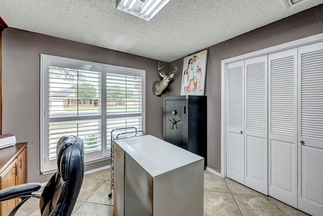 3513 Stanolind Ave, Midland, TX 79707 - office with light tile patterned floors and a textured ceiling
