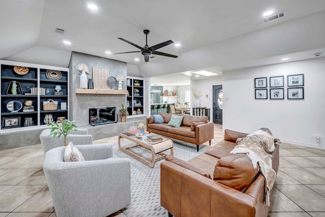 3513 Stanolind Ave, Midland, TX 79707 - tiled living room with ceiling fan, built in shelves, recessed lighting, a fireplace, and vaulted ceiling