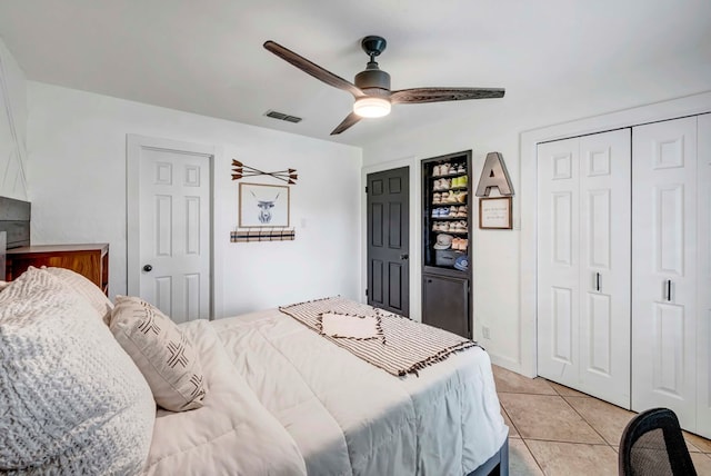 3513 Stanolind Ave, Midland, TX 79707 - bedroom featuring light tile patterned flooring and ceiling fan