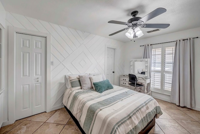 3513 Stanolind Ave, Midland, TX 79707 - bedroom featuring light tile patterned floors and ceiling fan