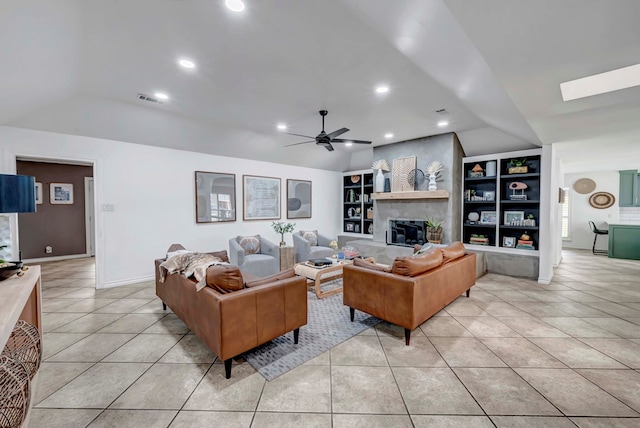 3513 Stanolind Ave, Midland, TX 79707 - living area featuring lofted ceiling, light tile patterned floors, a ceiling fan, built in features, and a fireplace