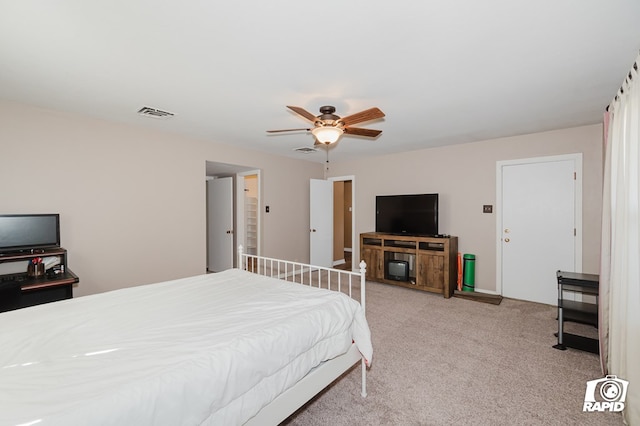 bedroom featuring a ceiling fan, light carpet, and visible vents