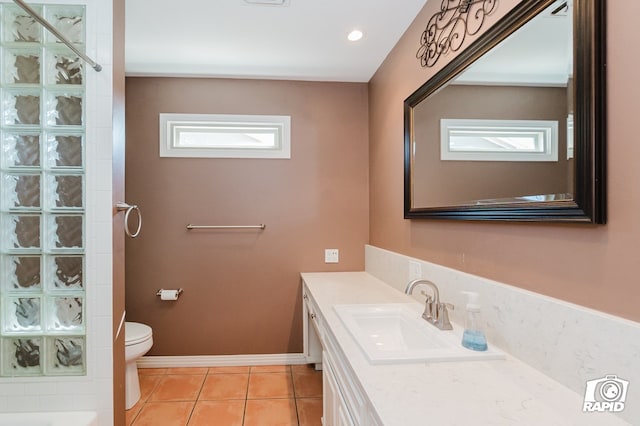 full bathroom featuring toilet, recessed lighting, vanity, baseboards, and tile patterned floors