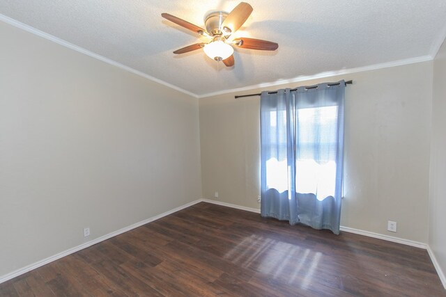 empty room with ceiling fan, dark hardwood / wood-style flooring, and a textured ceiling