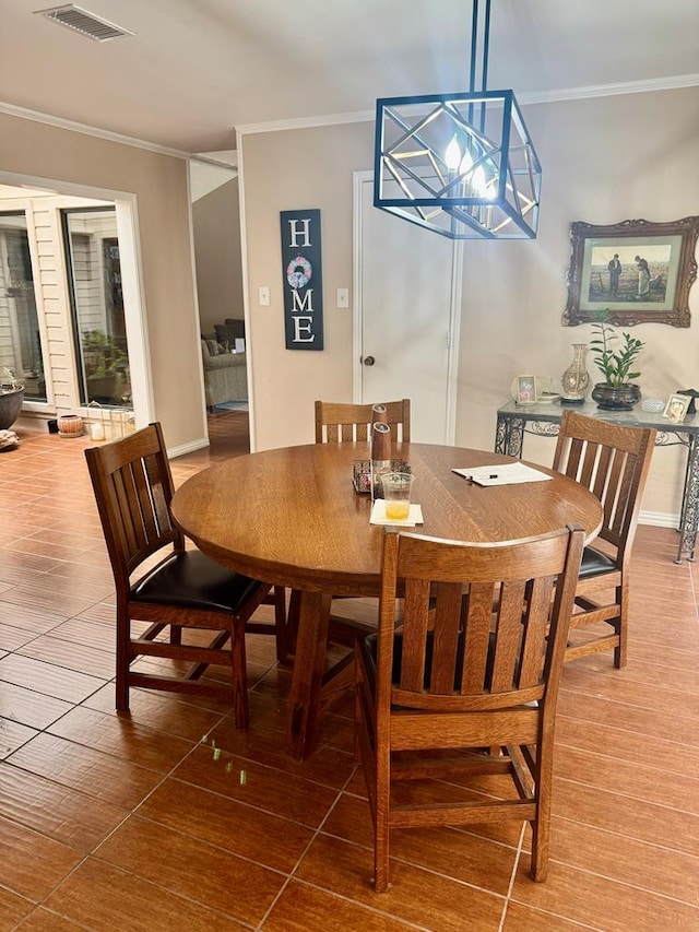 5103 Ashdown Pl, Midland, TX 79705 - dining space featuring crown molding and wood finished floors