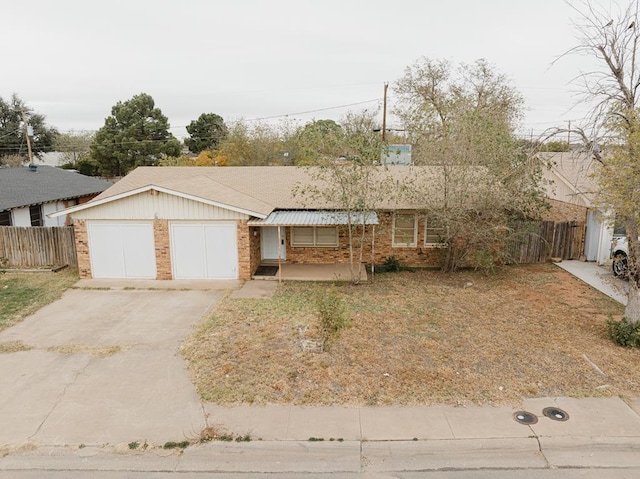 single story home featuring a garage