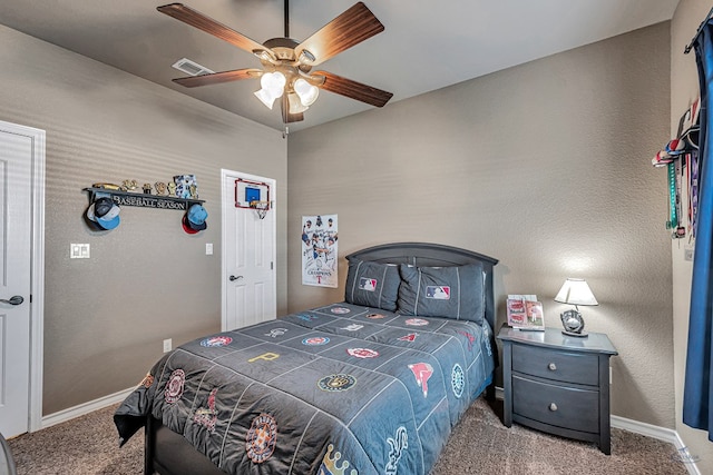 bedroom with ceiling fan and light carpet