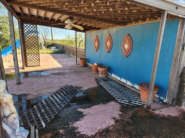 view of patio / terrace featuring ceiling fan