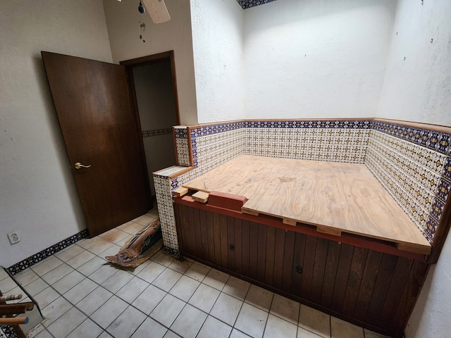 bathroom with tile patterned flooring