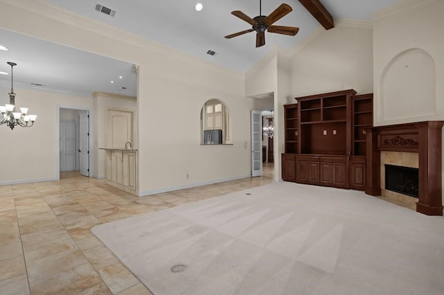 unfurnished living room featuring ornamental molding, a fireplace, beamed ceiling, and baseboards