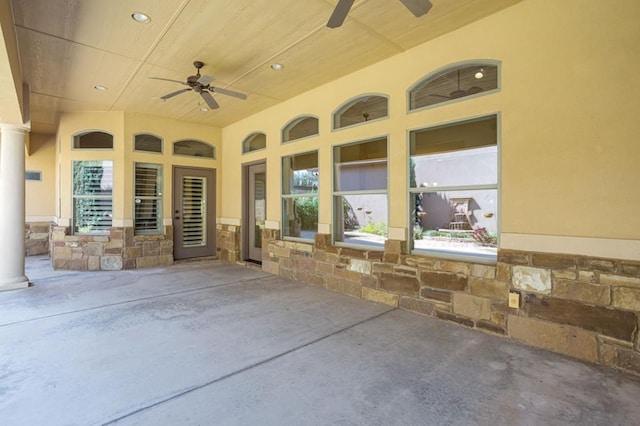 view of patio / terrace featuring ceiling fan