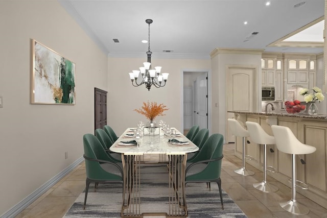 dining space featuring visible vents, baseboards, ornamental molding, an inviting chandelier, and recessed lighting